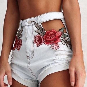 Rose embroidered cut out denim shorts